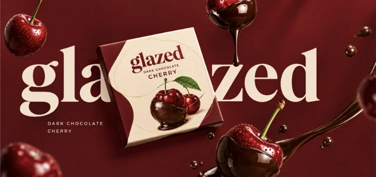 Supplied Glazed cherry chocolate packaging concept surrounded by cherries and flowing chocolate